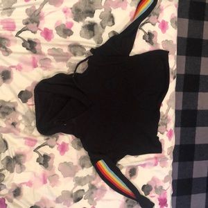A semi cropped black hoodie with rainbow stripes